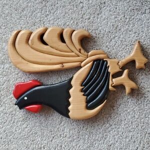 Wooden Rooster motto